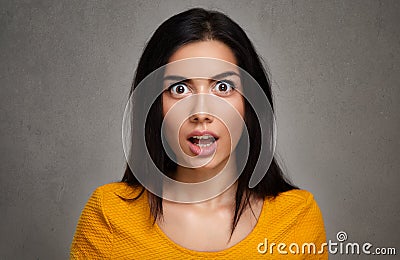 Surprise â€“ face of amazed woman Stock Photo